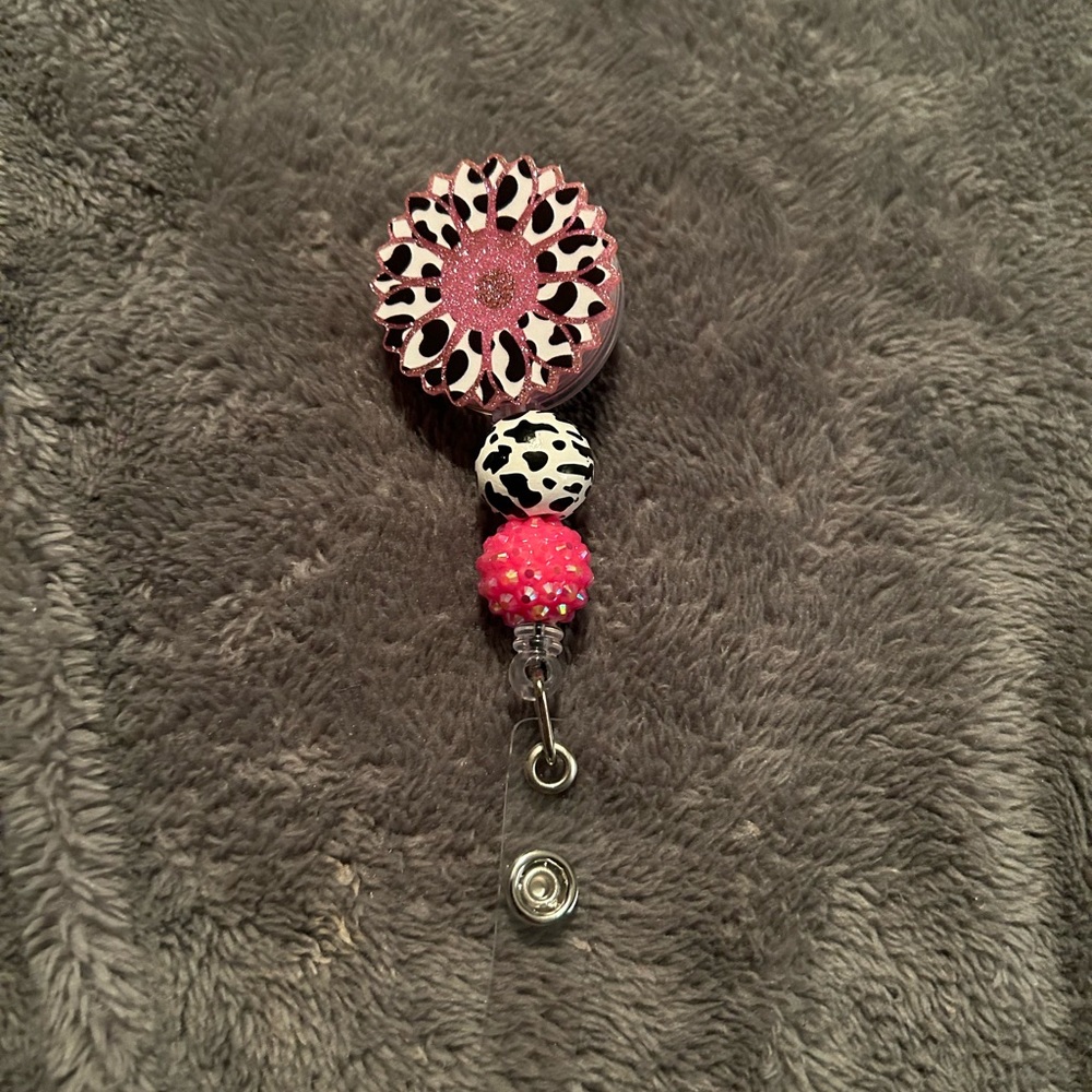 Flower badge reel